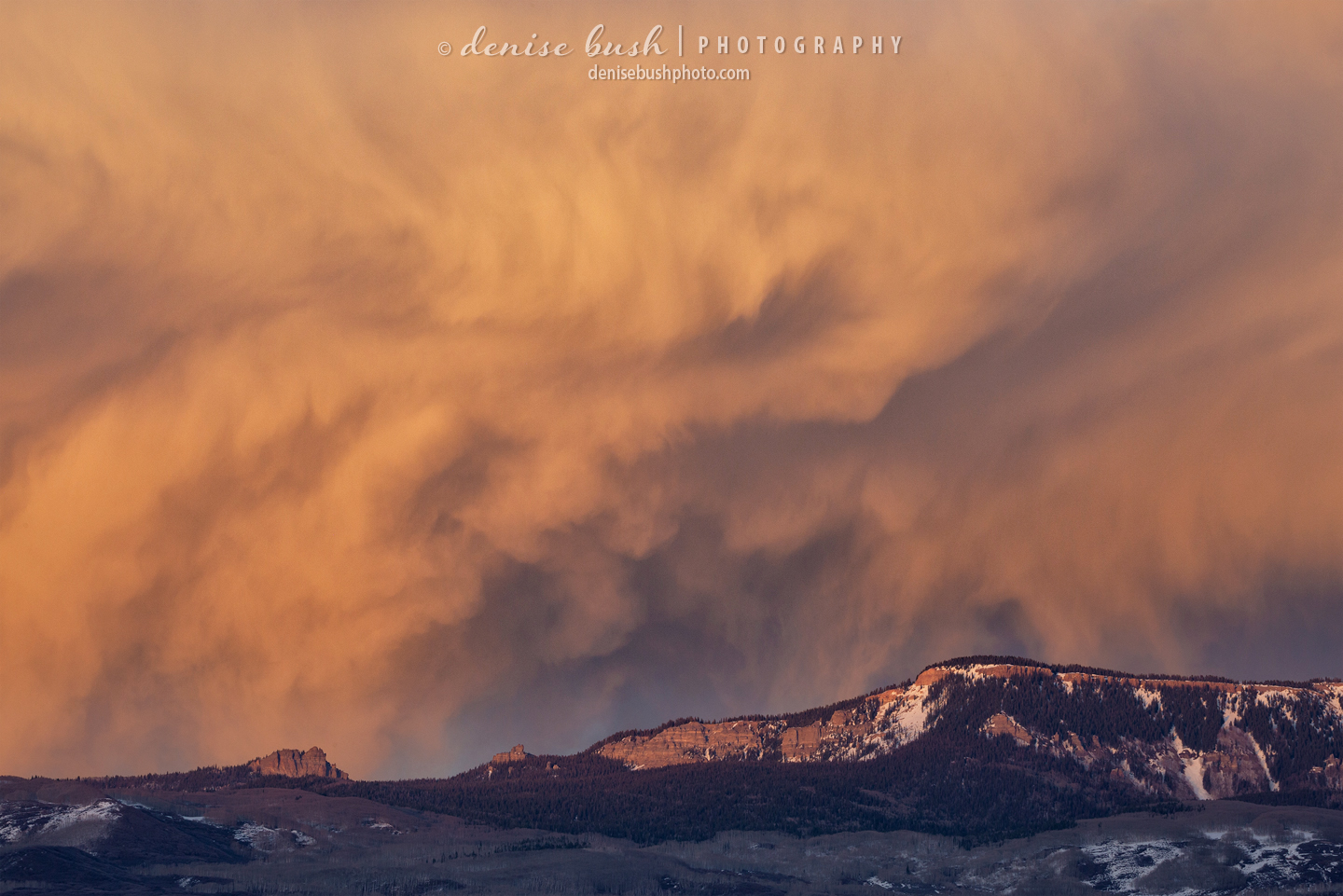 Some wild clouds hover above Storm King and The Castle at the northern end of the Cimarron Range of Colorado's San Juan Mountains.